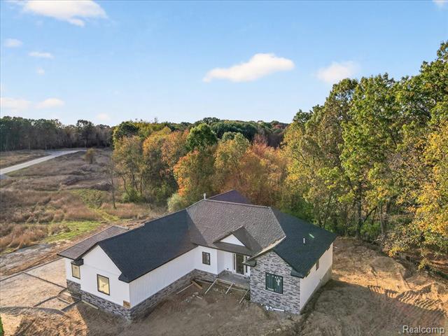 Builiding view thirty one for 4050 Metamora Ridge, Metamora, MI. 48455