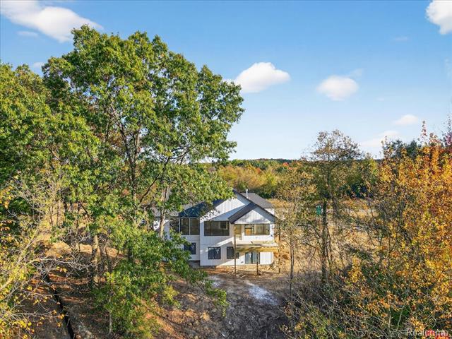 Builiding view thirty six for 4050 Metamora Ridge, Metamora, MI. 48455