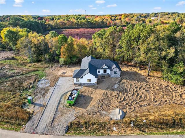 Builiding view thirty three for 4050 Metamora Ridge, Metamora, MI. 48455