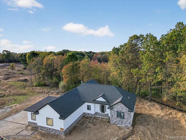 Builiding view thirty for 4050 Metamora Ridge, Metamora, MI. 48455