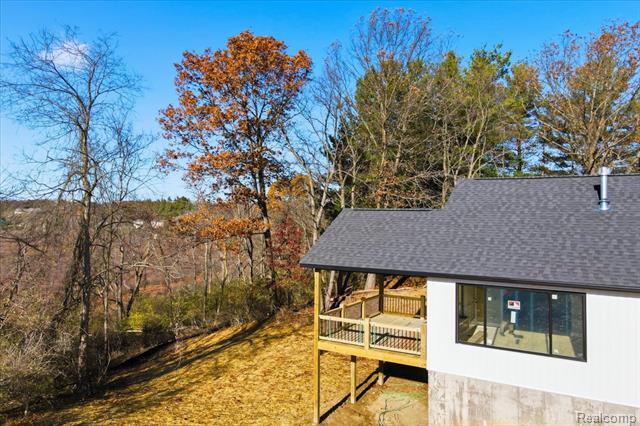 Builiding view three for 4050 Metamora Ridge, Metamora, MI. 48455