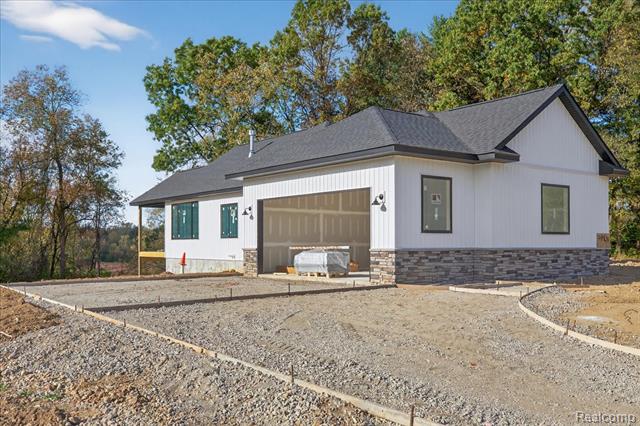 Builiding view twenty seven for 4050 Metamora Ridge, Metamora, MI. 48455