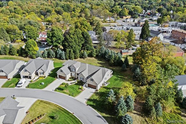 Builiding view forty seven for 68 Fox Hollow, Metamora, MI. 48455