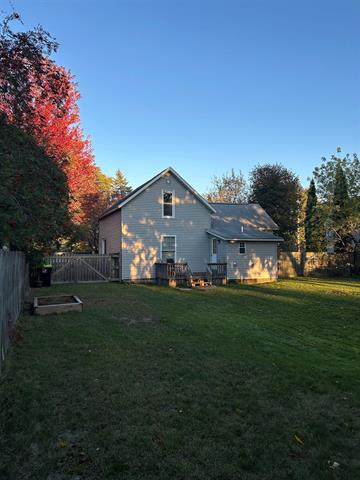 Builiding view eight for 203 Adams, East Tawas, MI. 48730