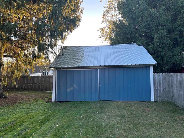 Builiding view five for 203 Adams, East Tawas, MI. 48730