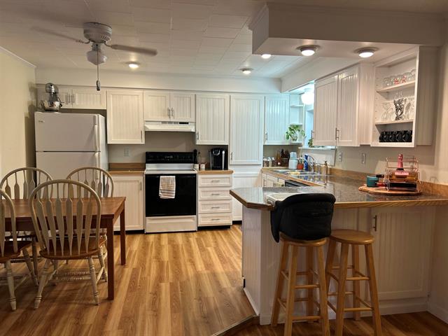 Builiding view nine for 203 Adams, East Tawas, MI. 48730