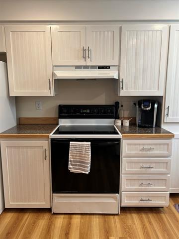 Builiding view thirteen for 203 Adams, East Tawas, MI. 48730