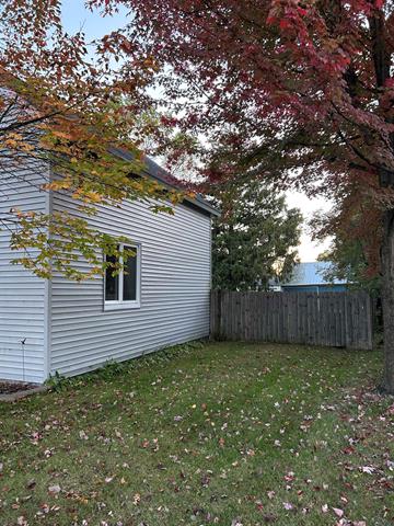 Builiding view thirty eight for 203 Adams, East Tawas, MI. 48730