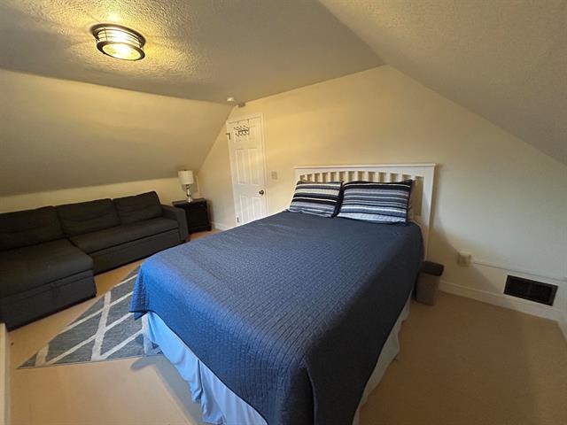 Builiding view thirty one for 203 Adams, East Tawas, MI. 48730