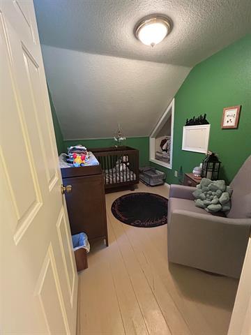 Builiding view twenty five for 203 Adams, East Tawas, MI. 48730