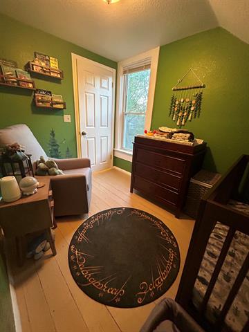 Builiding view twenty four for 203 Adams, East Tawas, MI. 48730