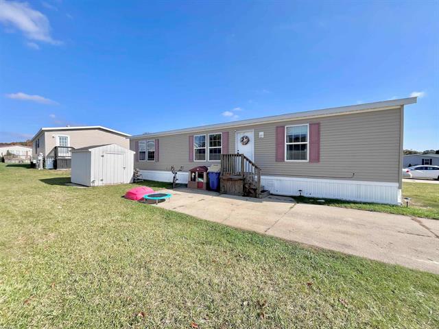 Builiding view three for 3667 Falcons Nest, White Lake, MI. 48383