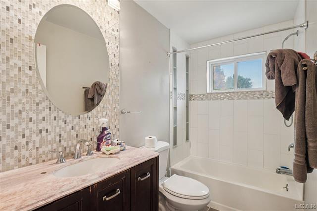 Builiding view ten for 9060 Wildwood Lake, Whitmore Lake, MI. 48189