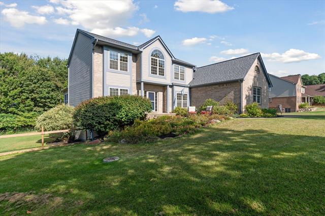 front view for 7261 N Lake Orchard Drive, Chelsea, Mi. 48118