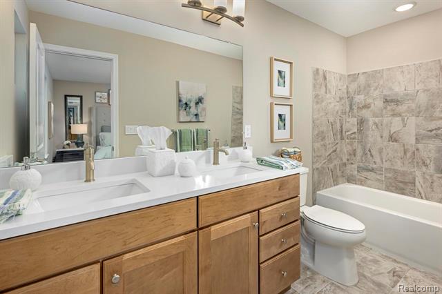 Builiding view nine for 56065 Madison, New Hudson, MI. 48165