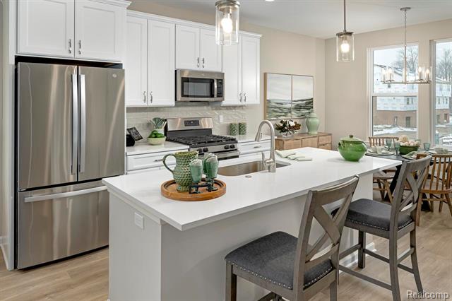 Builiding view seventeen for 56065 Madison, New Hudson, MI. 48165