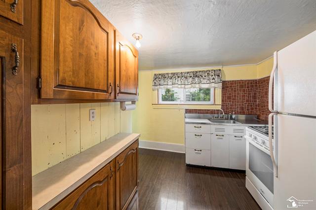 Builiding view ten for 128 First, Milan, MI. 48160