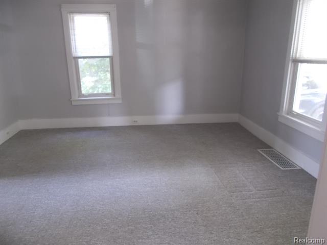 Builiding view six for 621 Meek, Caro, MI. 48723