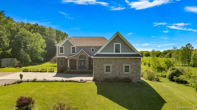 Builiding view sixty five for 5035 Hidden Ridge, Metamora, MI. 48455