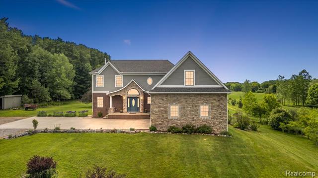Builiding view sixty six for 5035 Hidden Ridge, Metamora, MI. 48455