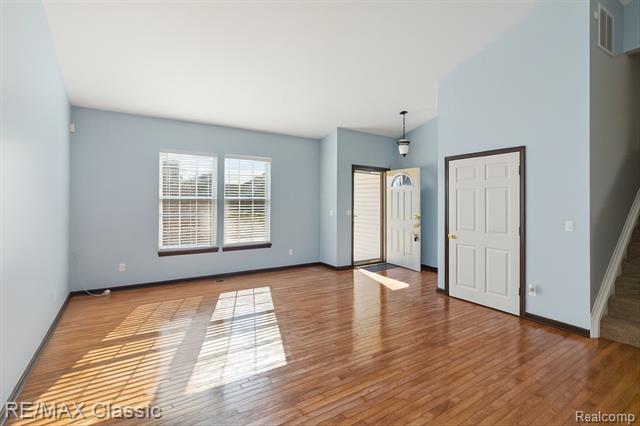 Builiding view eight for 868 Deer Run Lake, Holly, MI. 48442