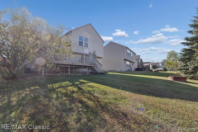 Builiding view forty six for 868 Deer Run Lake, Holly, MI. 48442