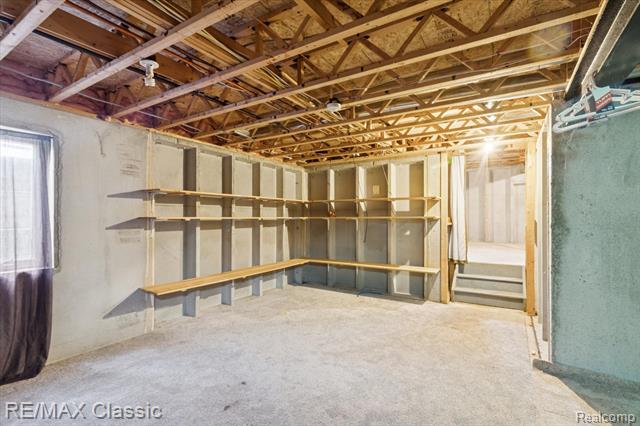 Builiding view forty for 868 Deer Run Lake, Holly, MI. 48442