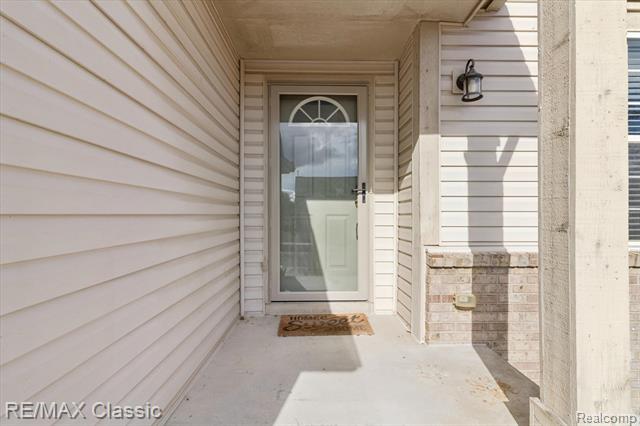 Builiding view four for 868 Deer Run Lake, Holly, MI. 48442