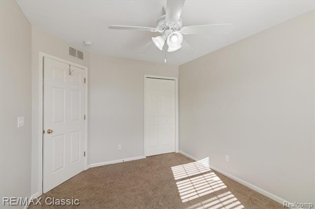 Builiding view thirty two for 868 Deer Run Lake, Holly, MI. 48442