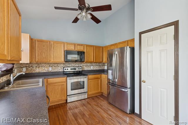 Builiding view twelve for 868 Deer Run Lake, Holly, MI. 48442