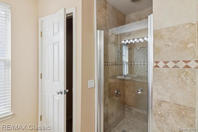 Builiding view twenty four for 868 Deer Run Lake, Holly, MI. 48442