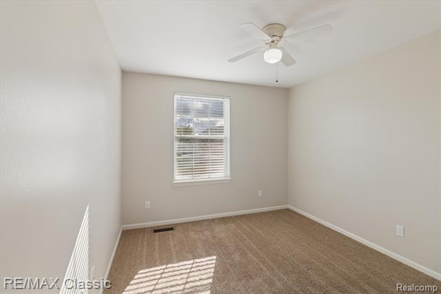 Builiding view twenty seven for 868 Deer Run Lake, Holly, MI. 48442