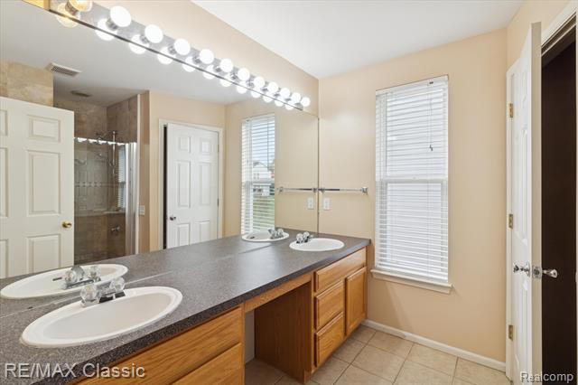 Builiding view twenty three for 868 Deer Run Lake, Holly, MI. 48442