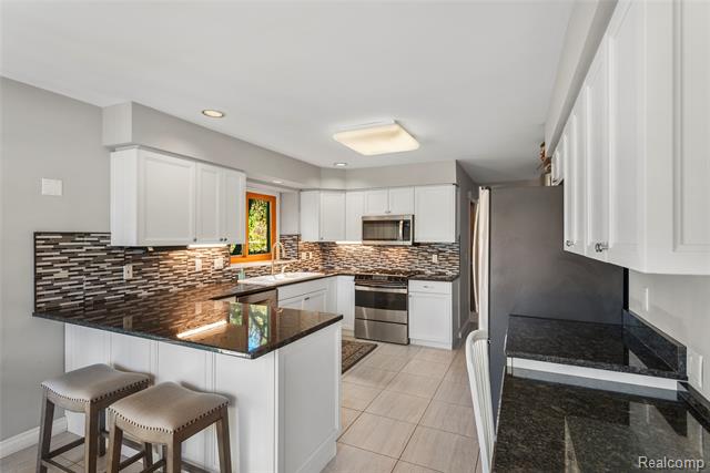 Builiding view thirteen for 990 Brewer, Leonard, MI. 48367