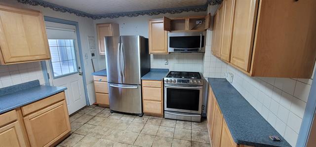 Builiding view fourteen for 519 E Glass, Ortonville, MI. 48462