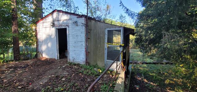 Builiding view nine for 519 E Glass, Ortonville, MI. 48462