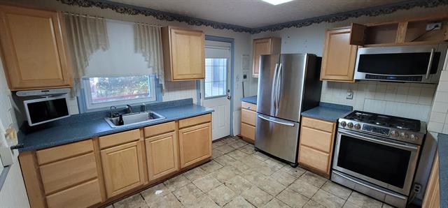 Builiding view thirteen for 519 E Glass, Ortonville, MI. 48462