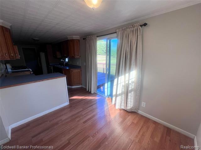 Builiding view nine for 904 Rowland, Leonard, MI. 48367