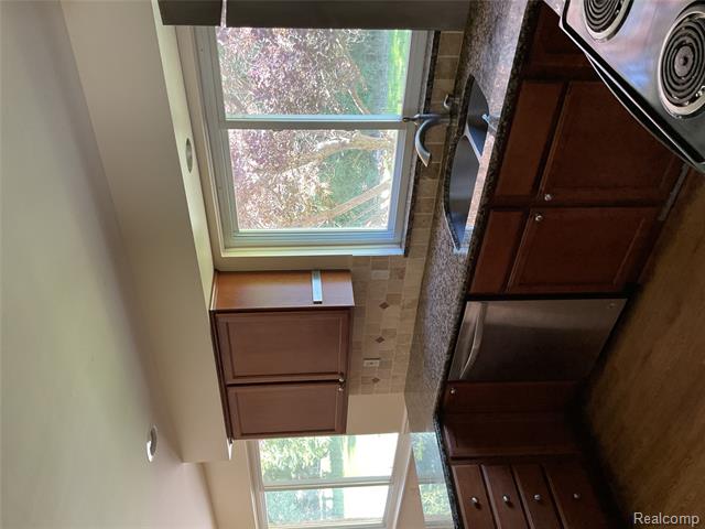 Builiding view thirty for 7096 Riverstone, West Bloomfield, MI. 48322