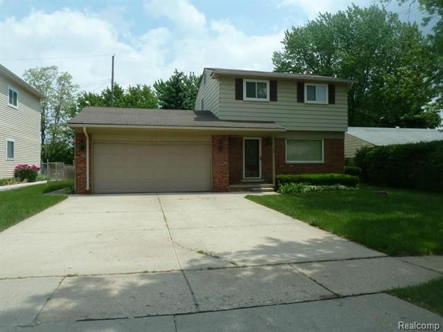front view for 705 Sheffield Rd, Auburn Hills, Mi. 48326