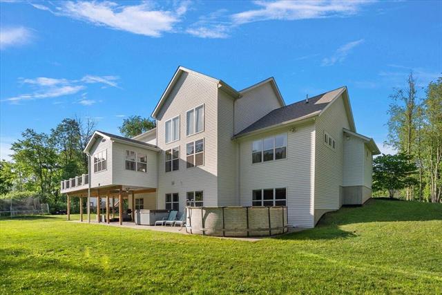 Builiding view one hundred five for 7654 Burrstone, Caledonia, MI. 49316