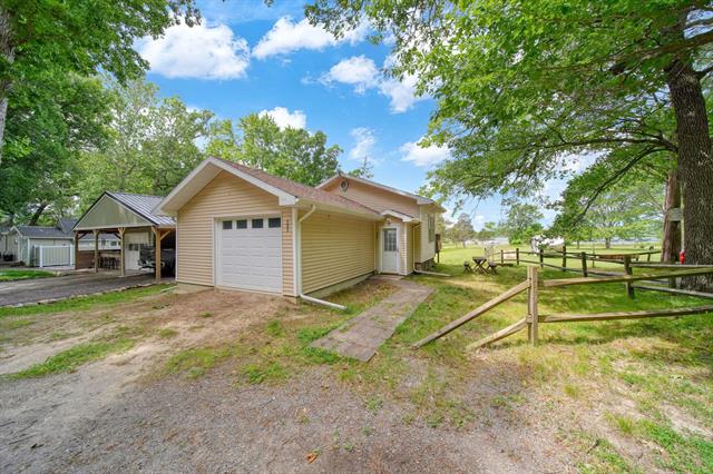 front view for 303 Cranberry Lake Road, Jackson, Mi. 49201