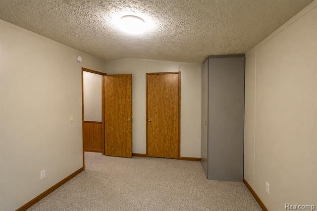 Builiding view seven for 23 Highland Terrace, White Lake, MI. 48386