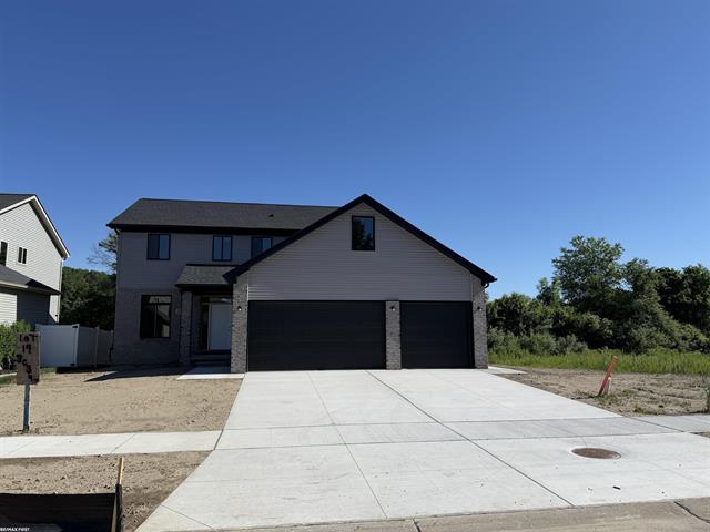 front view for 30343 Weathervane Woods Drive, New Haven, Mi. 48048