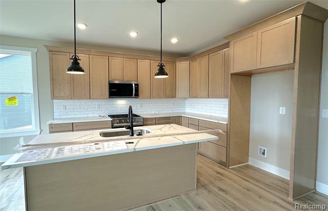 Builiding view six for 659 Round Rock Dr, Howell, MI. 48843