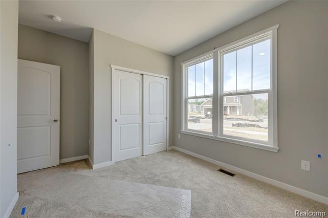 Builiding view three for 659 Round Rock Dr, Howell, MI. 48843