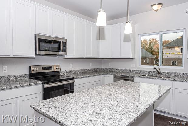 Builiding view three for 34641 John Bartley Circle, Sterling Heights, MI. 48310