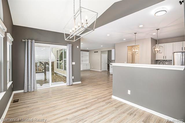 Builiding view five for 59696 Twin Pines, New Hudson, MI. 48165