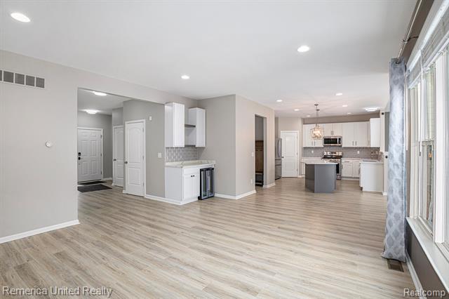 Builiding view four for 59696 Twin Pines, New Hudson, MI. 48165