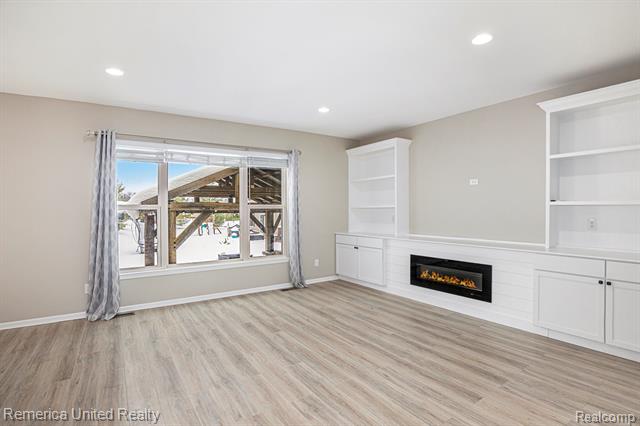 Builiding view three for 59696 Twin Pines, New Hudson, MI. 48165